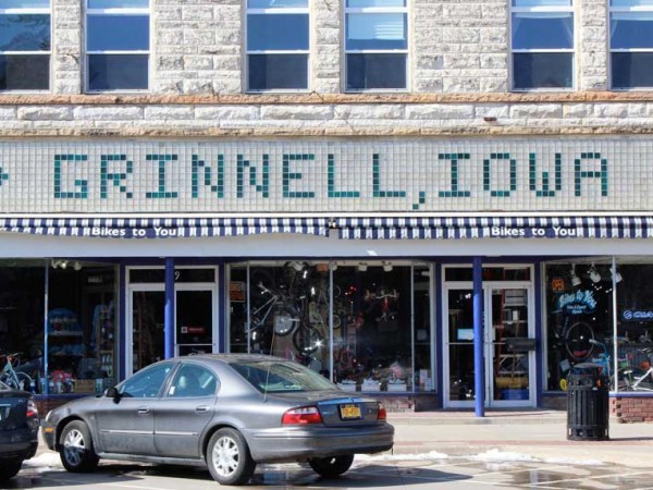 Grinnell, Iowa spelled in building tiles in Downtown Grinnell